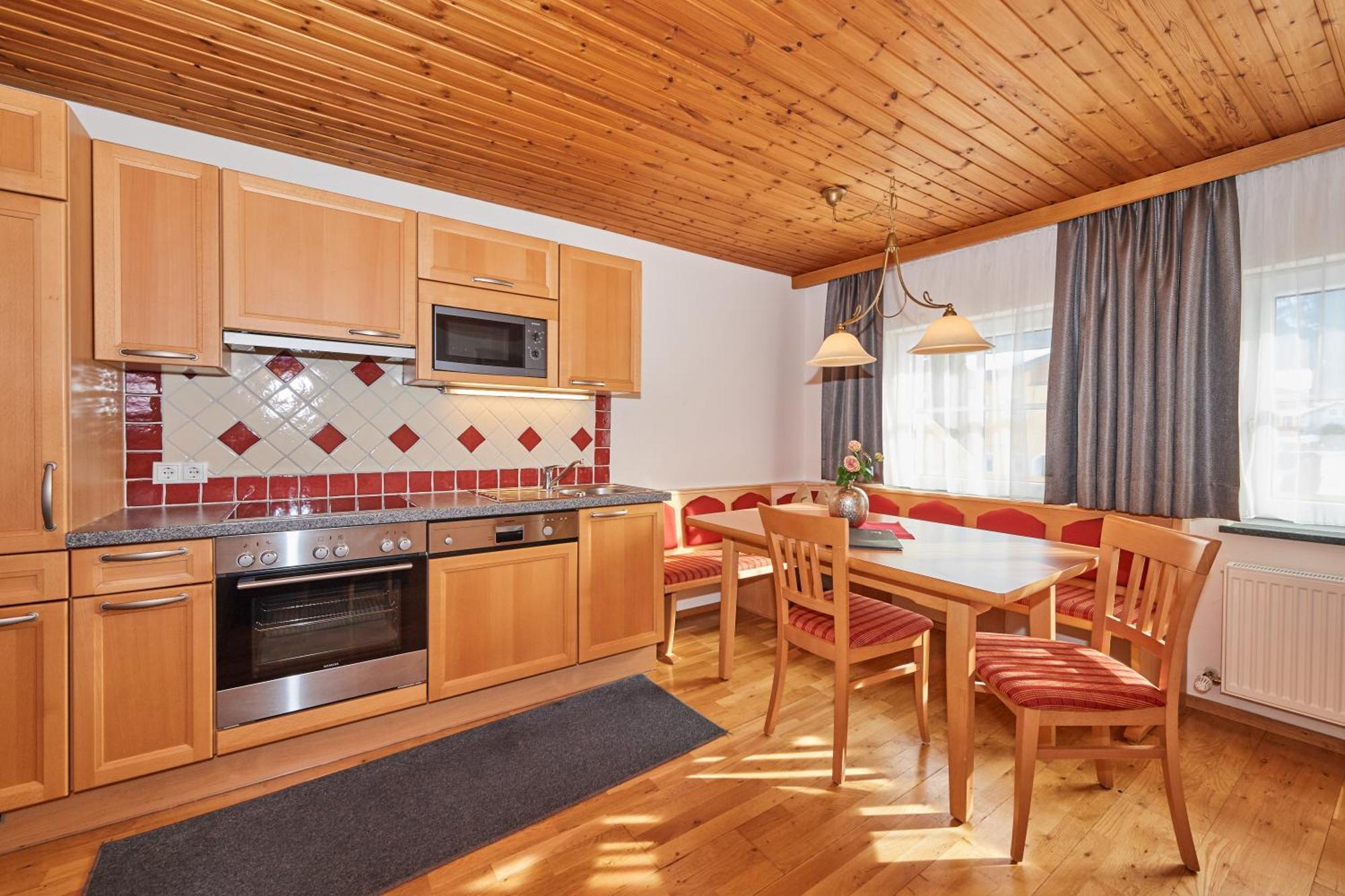 Rainerhof Aparthotel Флахау Стая снимка